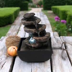 מזרקה עם אור ואבנים 18*13